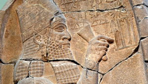 Esarhaddon, detail from his Victory Stele, c. 671 BCE. Basalt. Pergamon Museum, Berlin.