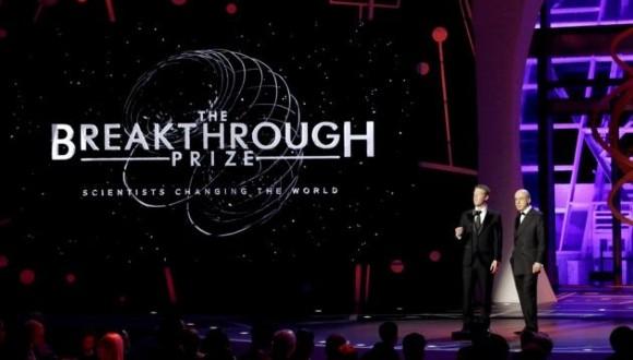 Facebook CEO Mark Zuckerberg and Russian billionaire investor Yuri Milner speak onstage during a Breakthrough Prize awards ceremony in 2016. (Getty Images for Breakthrough Prize / Kimberly White).