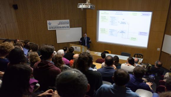 Prof. Alain Dagher at his lecture