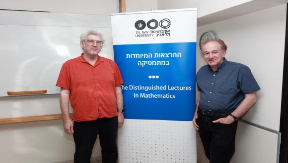 IAS Guest Scholar Prof. Shmuel Weinberger (University of Chicago) and his academic host Prof. Leonid Polterovich (School of Mathematical Sciences)